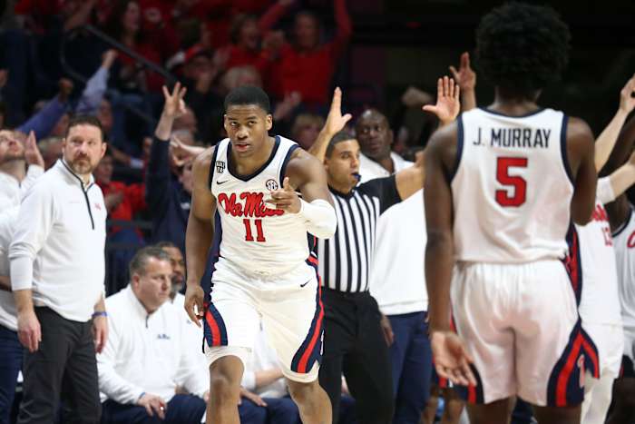 Dec 5, 2023; Oxford, Mississippi, USA; Mississippi Rebels guard Matthew Murrell (11) reacts toward guard Jaylen Murray (5) after a three point basket during the second half at The Sandy and John Black Pavilion at Ole Miss. Mandatory Credit: Petre Thomas-USA TODAY Sports